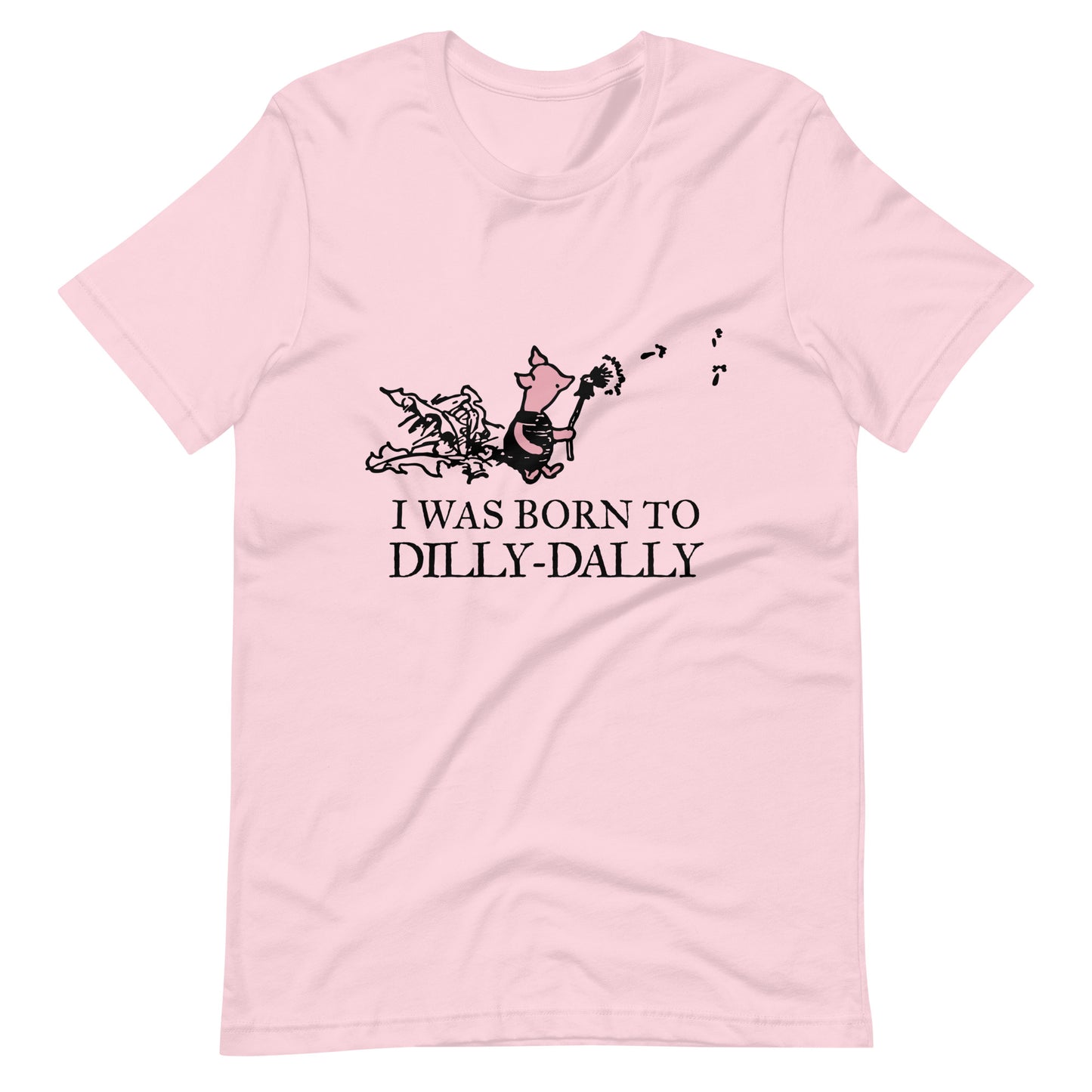 women's t-shirt featuring Piglet blowing dandelion seeds with text: I Was Born To Dilly-Dally; graphic tee; Winnie the Pooh apparel; funny tshirt; online tshirt store; bella canvas 3001 soft pink